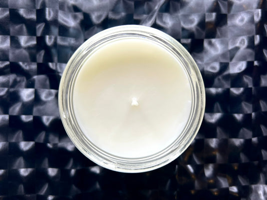 Top-down view of World's Best Boss candle's smooth white wax