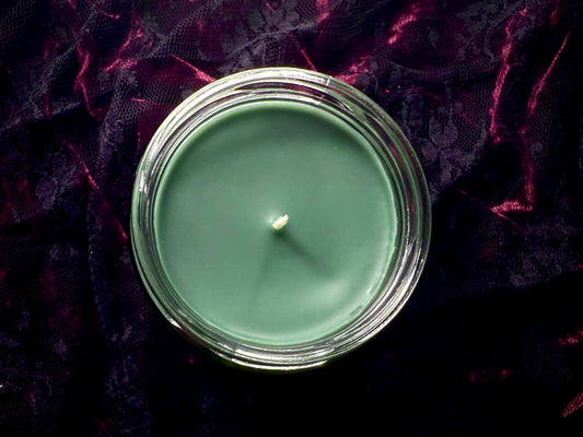 Top-down view of Louis de Pointe du Lac candle's green wax surface