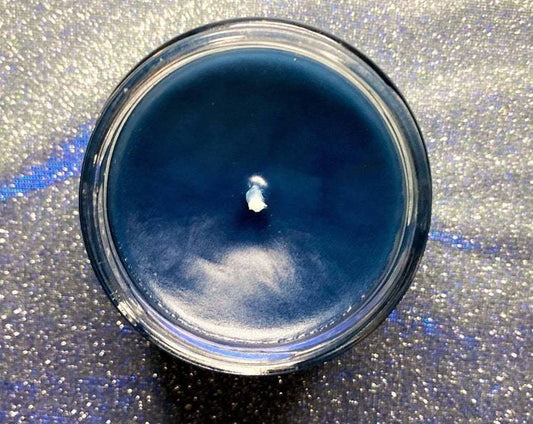 Top-down view of open Azriel candle showing navy wax