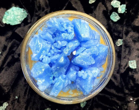 Top-down view of the open Heisenberg candle with blue crystal wax chunks