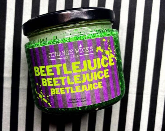 Closed Beetlejuice candle jar with purple striped label