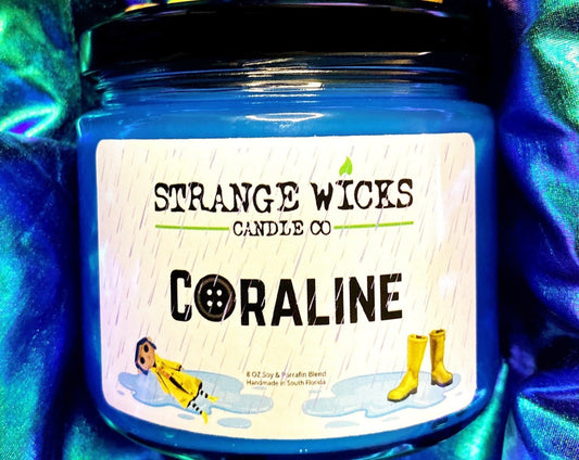 Close-up of Coraline candle label on blue jar