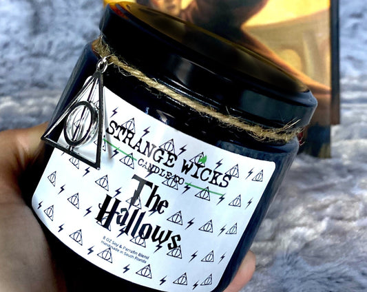 The Hallows Candle held in hand showing the Deathly Hallows label