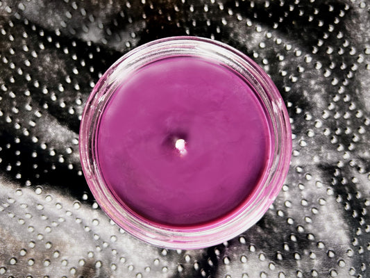 Top-down view of Kaz candle's purple wax