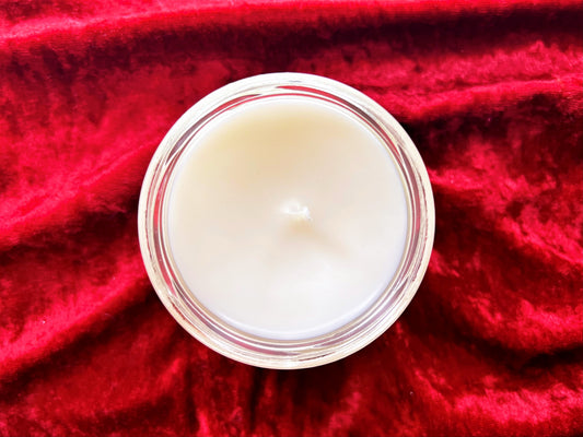 Top-down view of Patrick Bateman candle showing white wax and centered wick