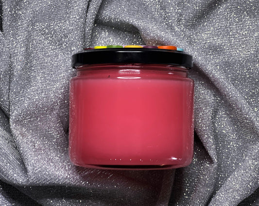 Top-down view of The Pink Palace candle's bright pink wax and wick