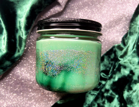 Glittered green Sassenach candle jar, no label