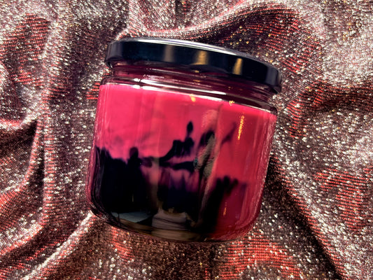 Back of Shiver With Anticipation candle showing red and black swirled wax
