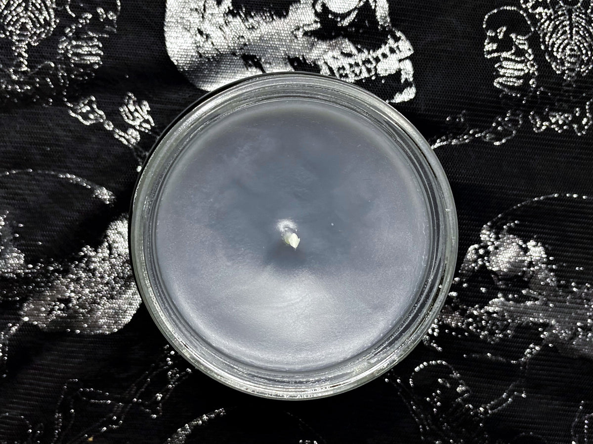 Top-down view of the open Tate Langdon candle's slate-gray wax