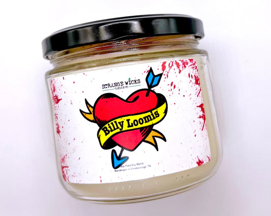 Close-up of Billy Loomis candle label with heart-and-arrow art