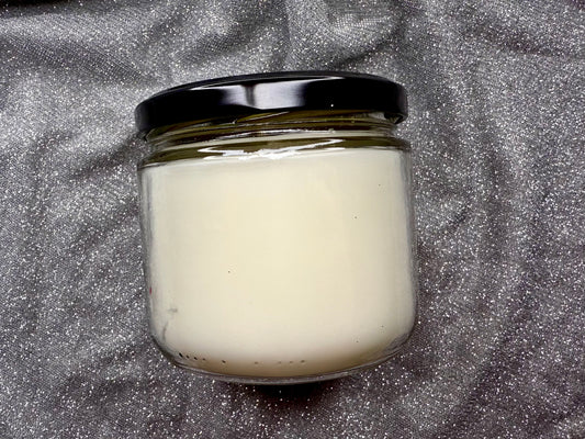 Back view of The Substance candle, plain white wax, no label