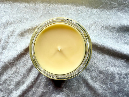 Top-down view of Midwest Emo candle's smooth yellow wax