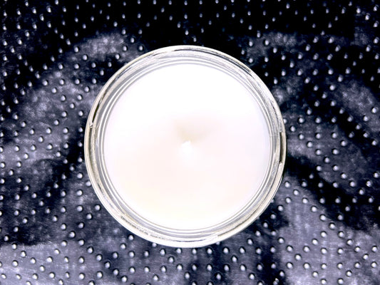 Top-down view of the Supernatural candle, unlit wick in white wax