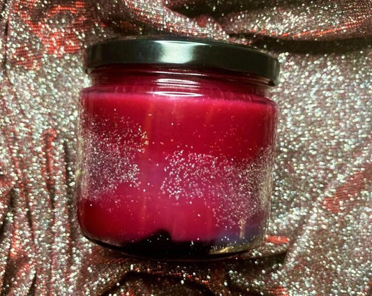 Red Cassian candle jar with lid and glittered wax