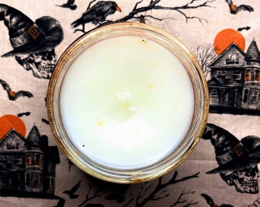 Top-down view of open Hocus Pocus candle showing white wax