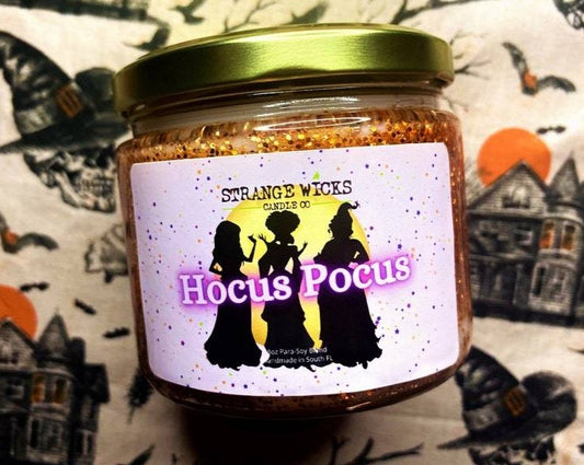 Close-up of Hocus Pocus candle label with Sanderson-sisters silhouettes