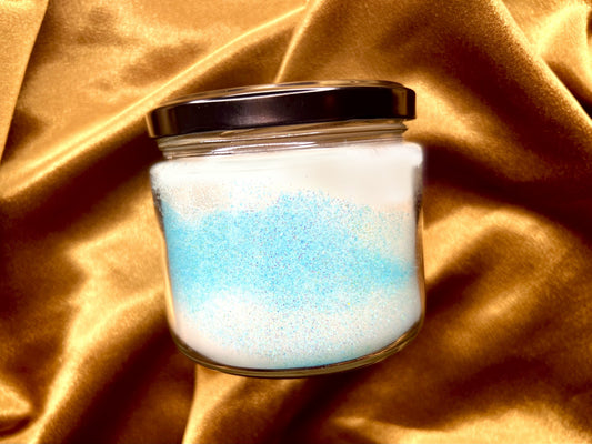 Side view of Achilles and Patroclus candle showing blue glitter wax