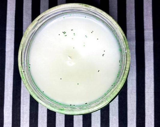 Top-down view of Beetlejuice candle's white wax with green speckles