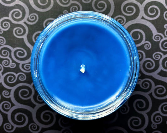 Top-down view of open Corpse Bride candle showing blue wax