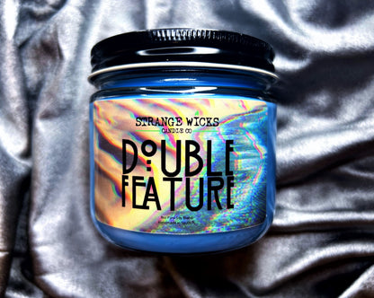 Double Feature - AHS Candle – blue jar candle with rainbow glitch art label