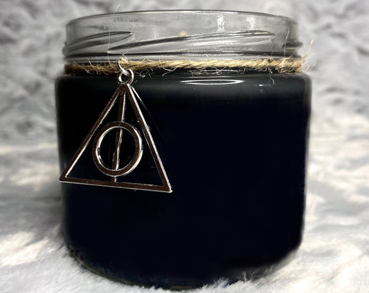 Back of The Hallows Candle jar with Deathly Hallows charm hanging from twine