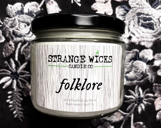 Close-up of the Folklore candle label on its closed glass jar