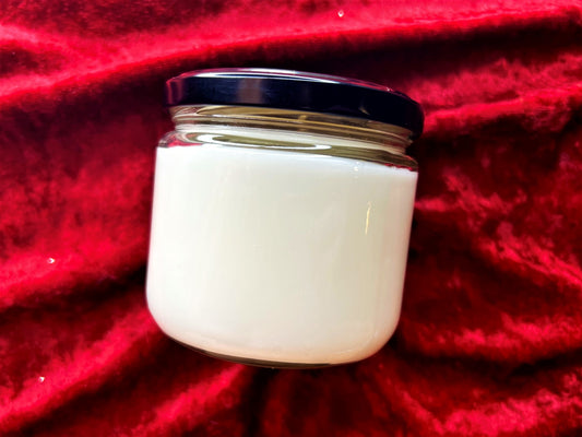 Back view of Patrick Bateman candle jar showing plain white wax