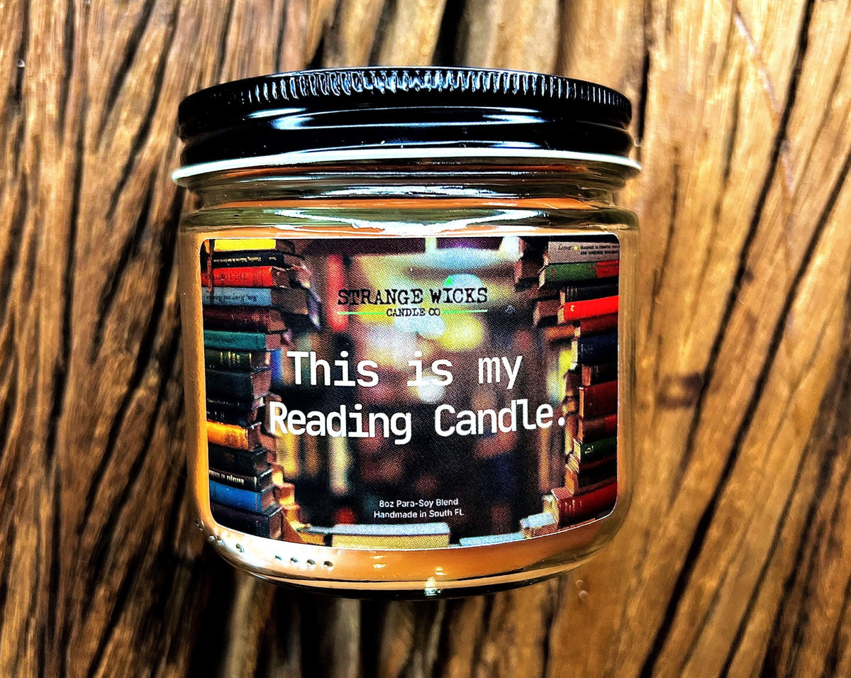 This is My Reading Candle – bookshelf-label jar on wood among books