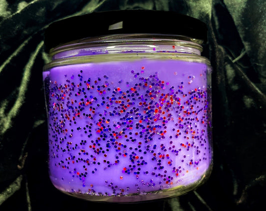 Back of Severus Candle jar showing purple and red glitter wax under black lid