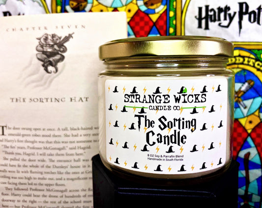 The Sorting Candle jar with gold lid beside open book on The Sorting Hat chapter